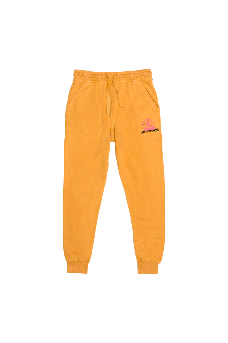 Kelly's Cove Joggers in bright yellow feature cotton fabric, elastic cuffs, a drawstring waist, handy pockets, and a small left-thigh graphic—perfect for adding comfort and color to your casual style.