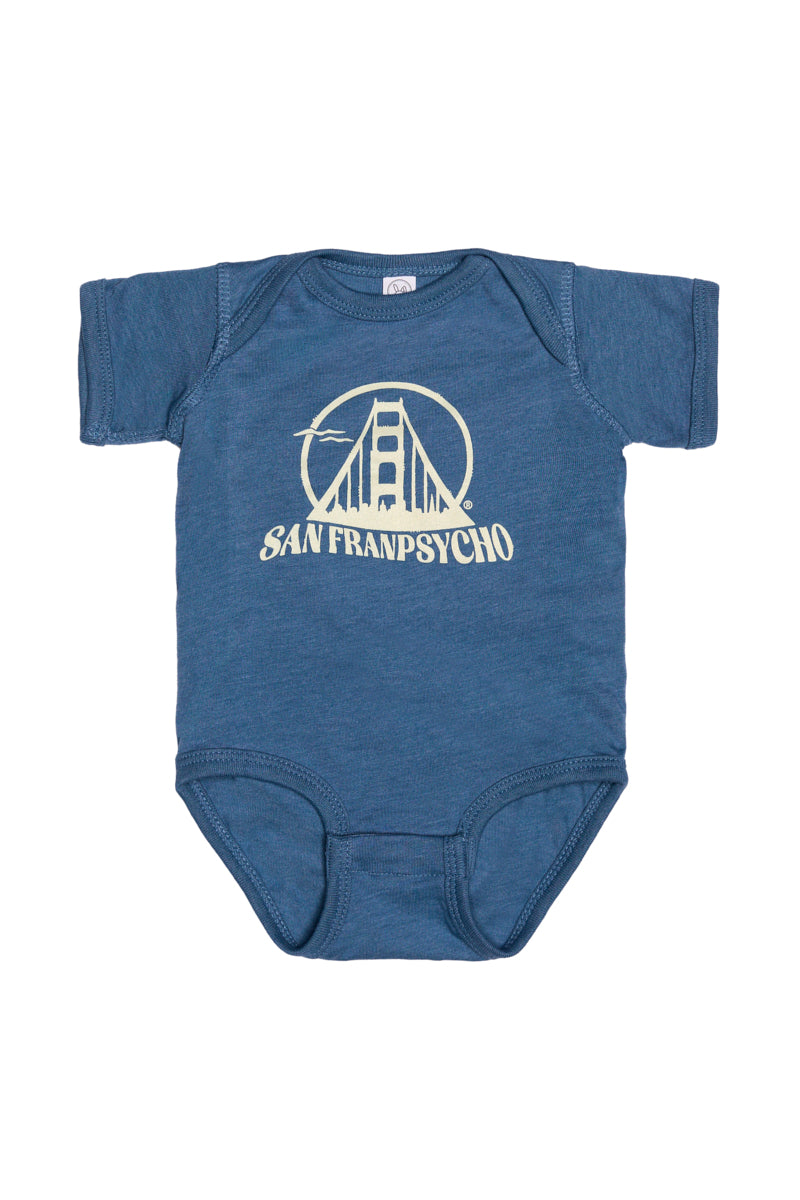 The Gull Logo Onesie is a hand-printed blue baby onesie featuring San Franpsycho's gull logo and a Golden Gate Bridge graphic on the front, inspired by Erik Abel.