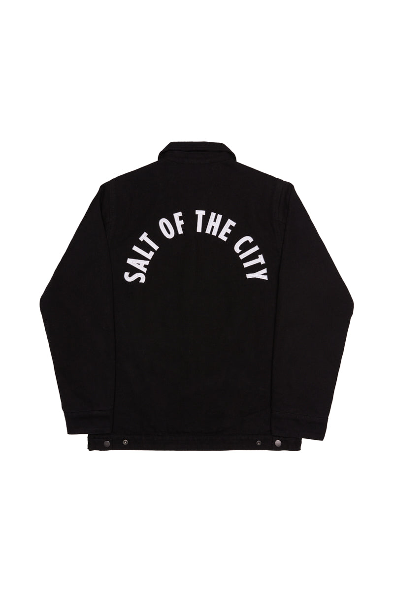 The Bridge Co. Chore Jacket features SALT OF THE CITY in white arched text on the upper back and offers classic workwear style, proudly made in San Francisco.