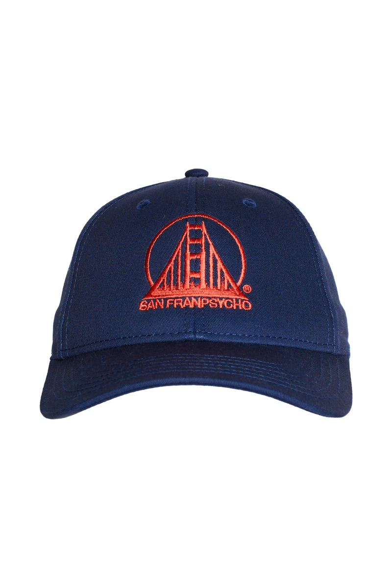 The Embroidered Logo Snapback - Navy & Poppy features a navy blue curved brim and an orange embroidered Golden Gate Bridge with SAN FRANPSYCHO text. This adjustable snapback offers comfort, style, and a one-size-fits-most design.