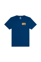 The Elemental Tee - Blue is a 100% cotton short sleeve shirt with a small rectangular patch on the left chest.
