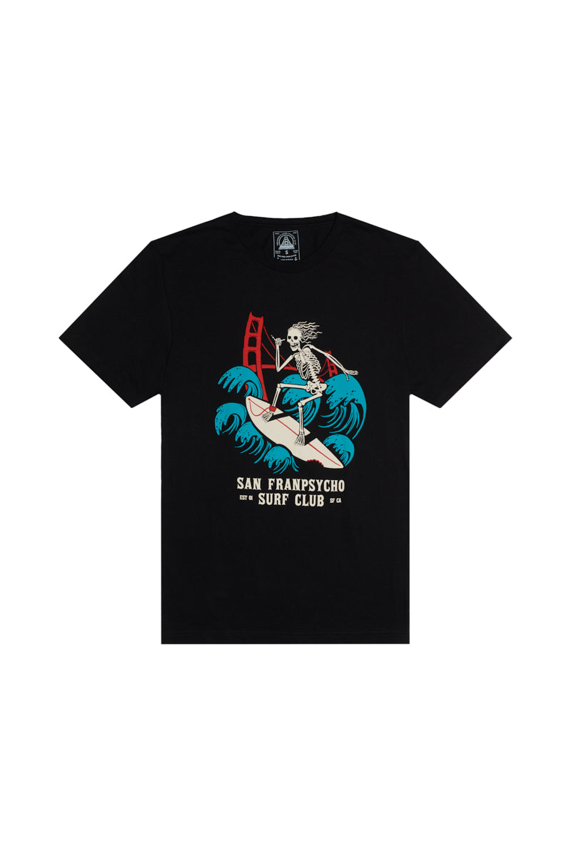 The Surf Club Tee features a skeleton surfing by the Golden Gate Bridge with “San Franpsycho Surf Club” text. This comfortable t-shirt is ideal for any surf enthusiast’s collection.