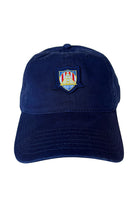 The WC x SFP Patched Hat is a navy blue baseball cap featuring a colorful embroidered shield logo on the front, perfect for any US Men's National Team or World Cup fan.