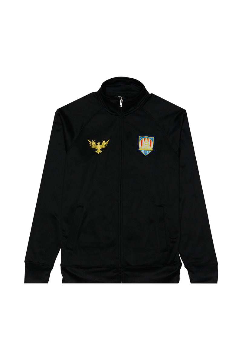 The WC x SFP Zip-Up Jacket features a gold eagle emblem and colorful shield crest on the chest, inspired by the US Men's National Team, shown laid flat on a white background.