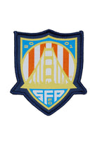 The WC x SFP Patch showcases a soccer badge with the Golden Gate Bridge, “2001” at the top, and “SFFC” at the bottom in blue and yellow—ideal for patches or Team USA fans.