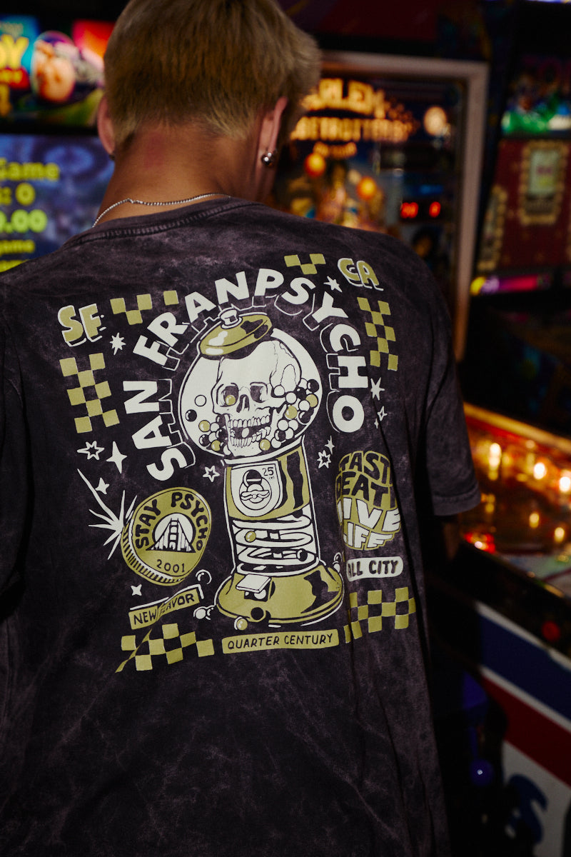 Black acid-wash Quarter Cent Tee with a gumball machine skull graphic on the back.