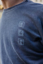 A blue 3D Logo Crewneck featuring a vertical row of three small, square San Franpsycho icons.