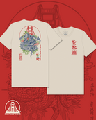 Discover the Year of the Snake Tee, featuring a unisex fit and soft Airlume cotton. This beige shirt showcases a striking dragon and Golden Gate Bridge design, vivid red and blue art, and a bold San Francisco logo.