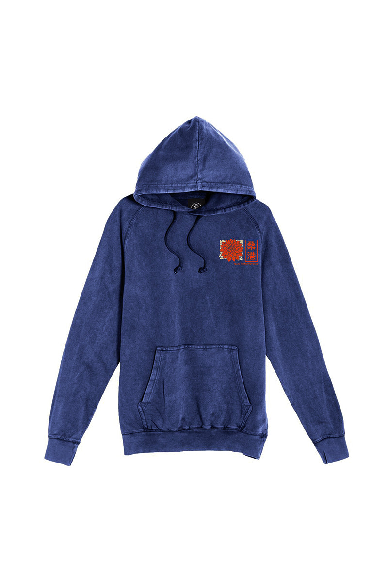 Sunset Dahlia Pullover Hoodie featuring a blue mineral wash finish, a hood and kangaroo pocket, and a subtle orange graphic on the left chest inspired by vintage textures and Japanese art tee aesthetics.