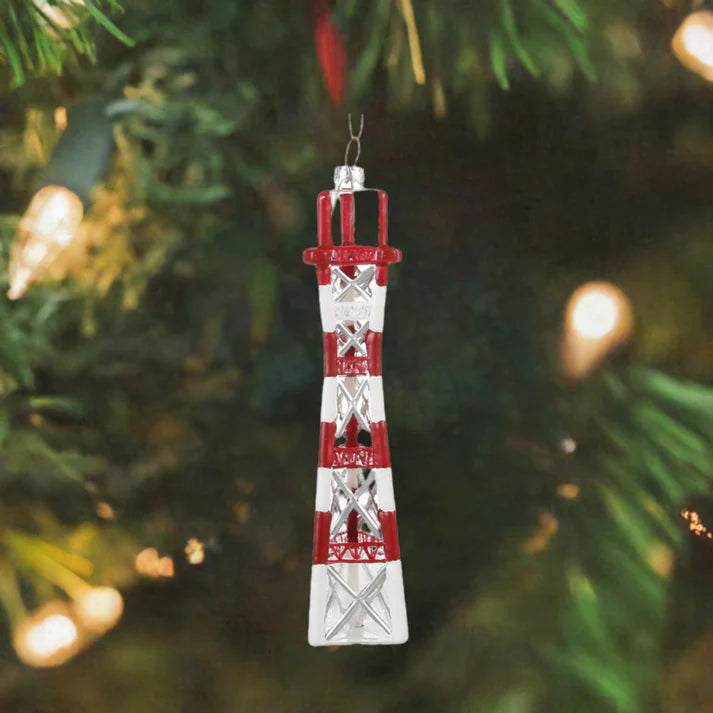 This festive ornament from Local Elves, inspired by Sutro Tower, adds a locally inspired touch to your Christmas tree with its vibrant red and white hues and twinkling lights. Hand-painted glass ornaments like the Xmas Ornaments - Local Elves bring a unique charm to holiday decorations.