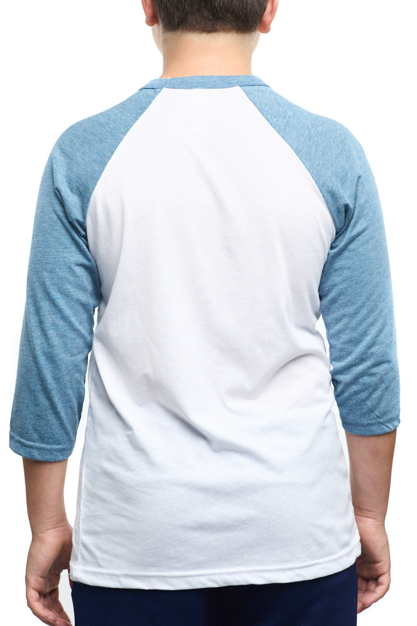 A child is sporting the Youth Seal Logo Baseball Tee, which is a white and blue raglan shirt with three-quarter sleeves, viewed from the back. Made from 100% cotton, this shirt provides both comfort and style for active days.