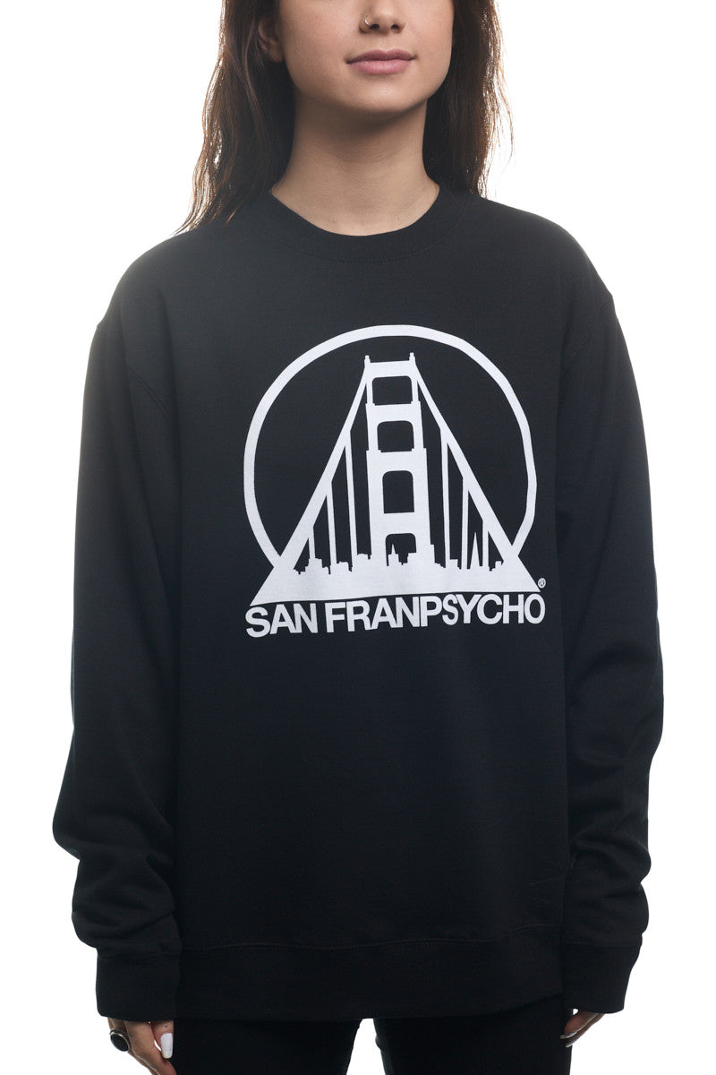 A person shows off their Black & White Logo Crewneck, a classic black sweatshirt featuring the iconic SFP logo—displaying a white design of the Golden Gate Bridge along with the text "San Franpsycho." Available in various sizes, this crewneck guarantees the perfect fit for all fans of this fashionable tribute to San Francisco.