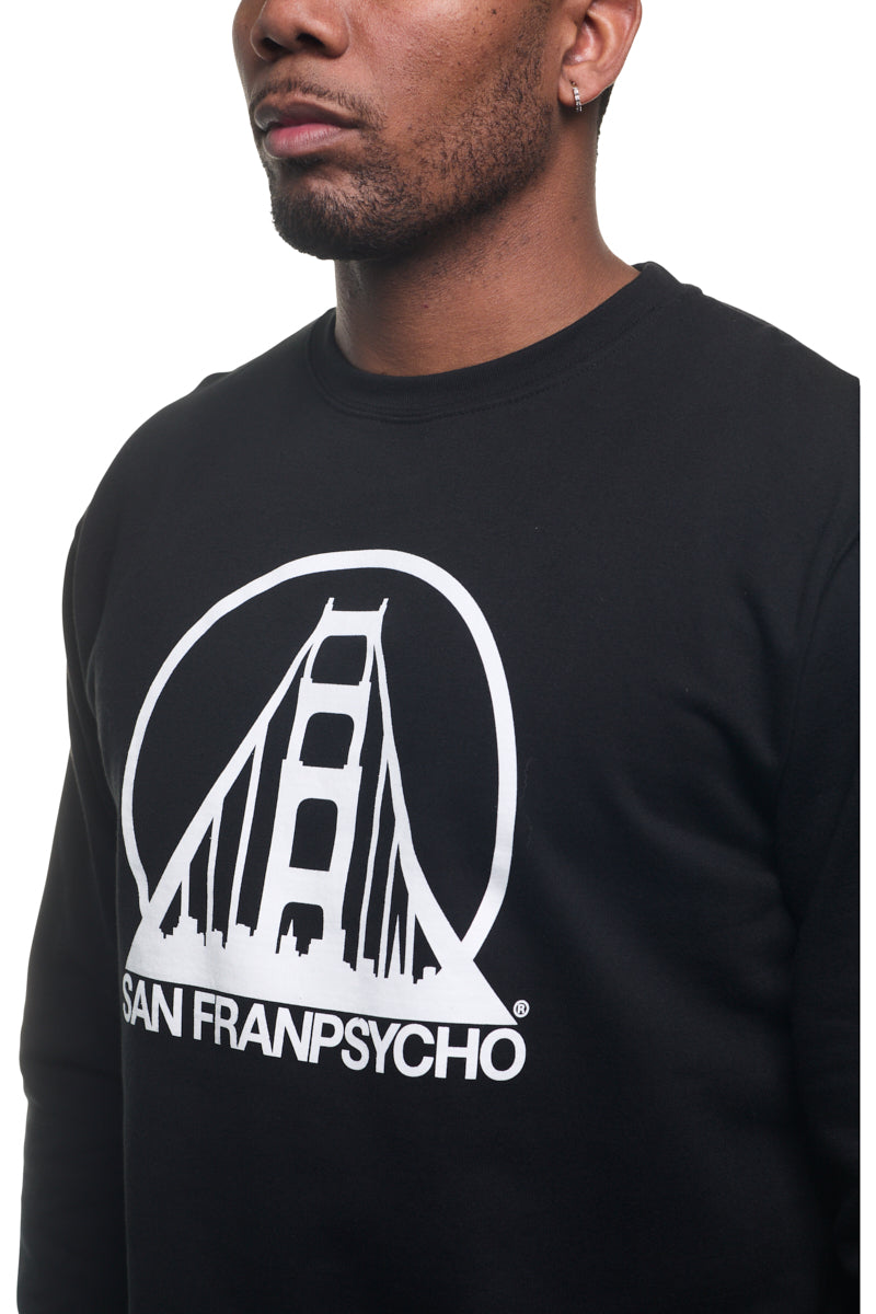 A person wearing the Black & White Logo Crewneck, showcasing the SFP logo with a white graphic of a bridge and San Franpsycho text.