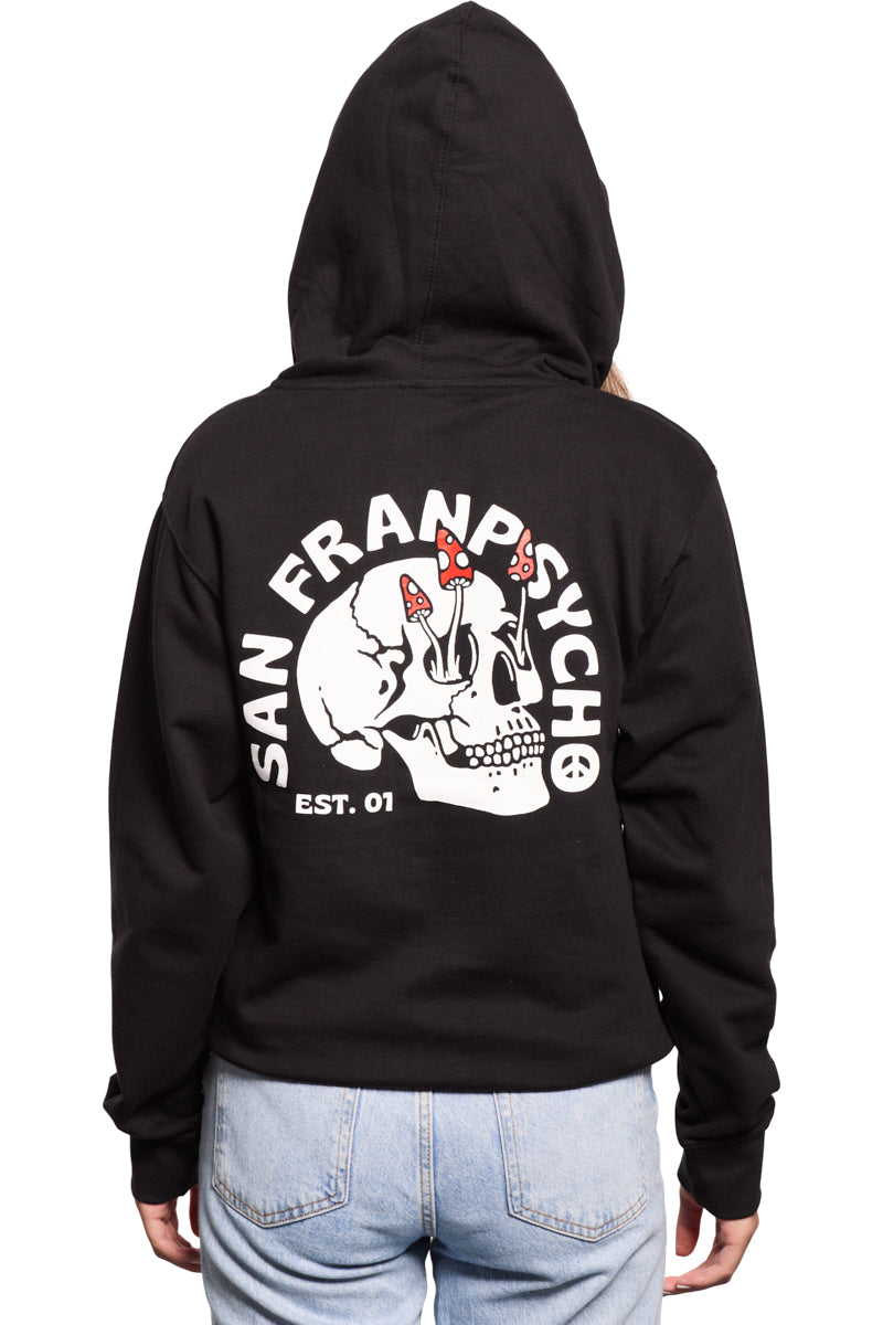 A person is wearing a Shroom Skull Zip-Up Hoodie, featuring a hand-printed black unique mushroom design and "San Franpsycho Est. 01" text on the back, crafted entirely from 100% cotton for optimal comfort and style.