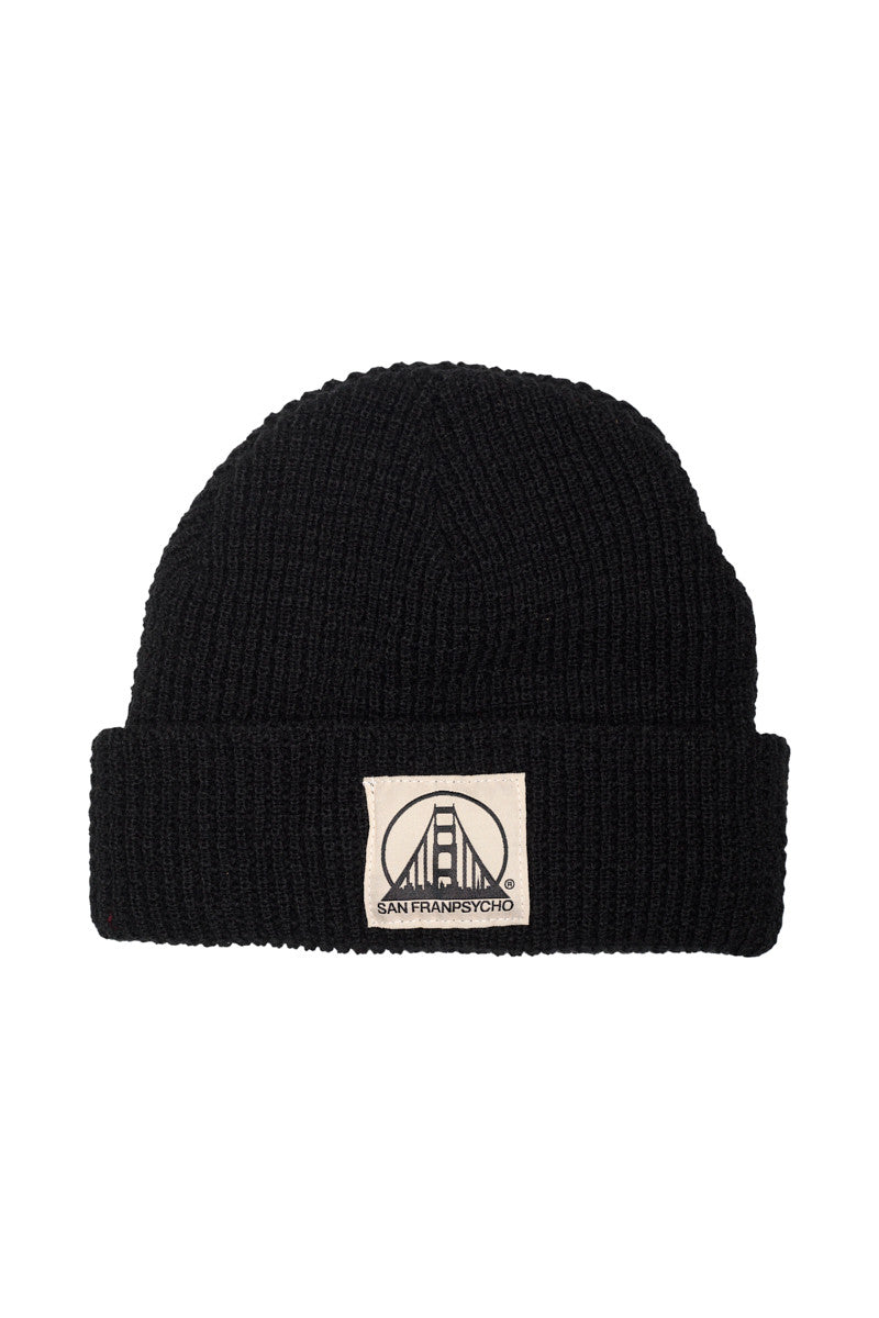 Introducing the Black Waffle Beanie with Natural/Black SFP Logo, featuring a patch that displays a bridge design along with the iconic San Franpsycho text. This beanie combines style and unmatched softness, providing warmth and comfort while showcasing the SFP Logo flair.
