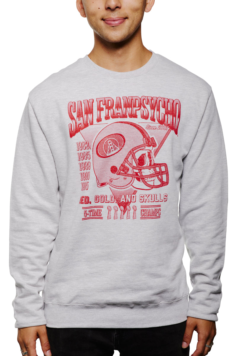 A man wearing the Candlestick Champs Crewneck, a vintage gray sweatshirt featuring San Fransycho and football graphics in red, is perfect for Niners season. This unisex crewneck seamlessly blends style with team spirit.