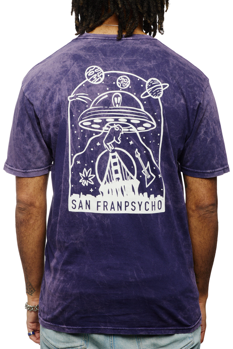 A person wearing a Psycho Invader Mineral Wash Tee from the Spring 2023 Collection features a UFO and space graphic on the back, embodying the essence of San Franpsycho's unique vibe.