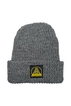 Zebra Lumberjack Beanie with a folded brim and a yellow patch featuring a bridge and Black/Yellow SFP Logo.